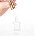 Botella de suero de vidrio botella de presión de aceite esencial