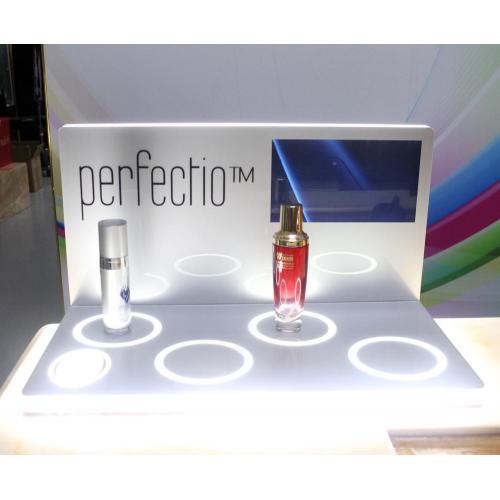Small clear acrylic display stand for cosmetics