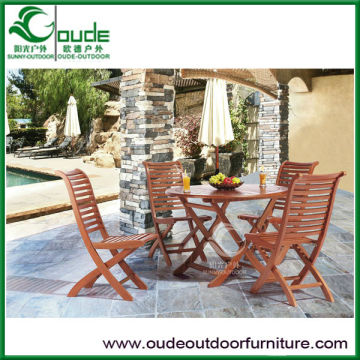 outdoor wooden furniture round table with folding chairs