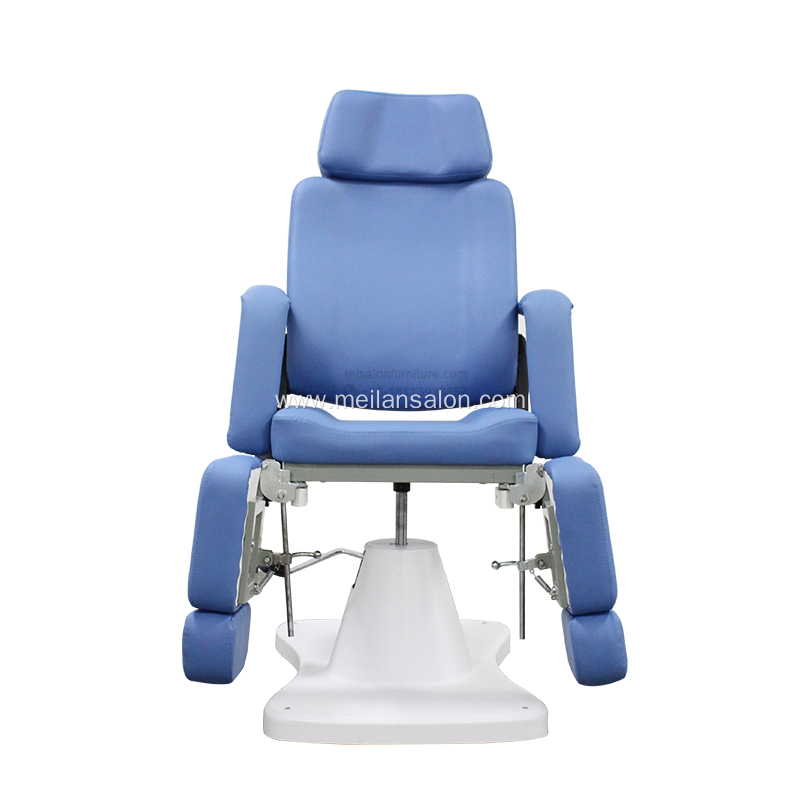 Hydraulic salon chair with footrest