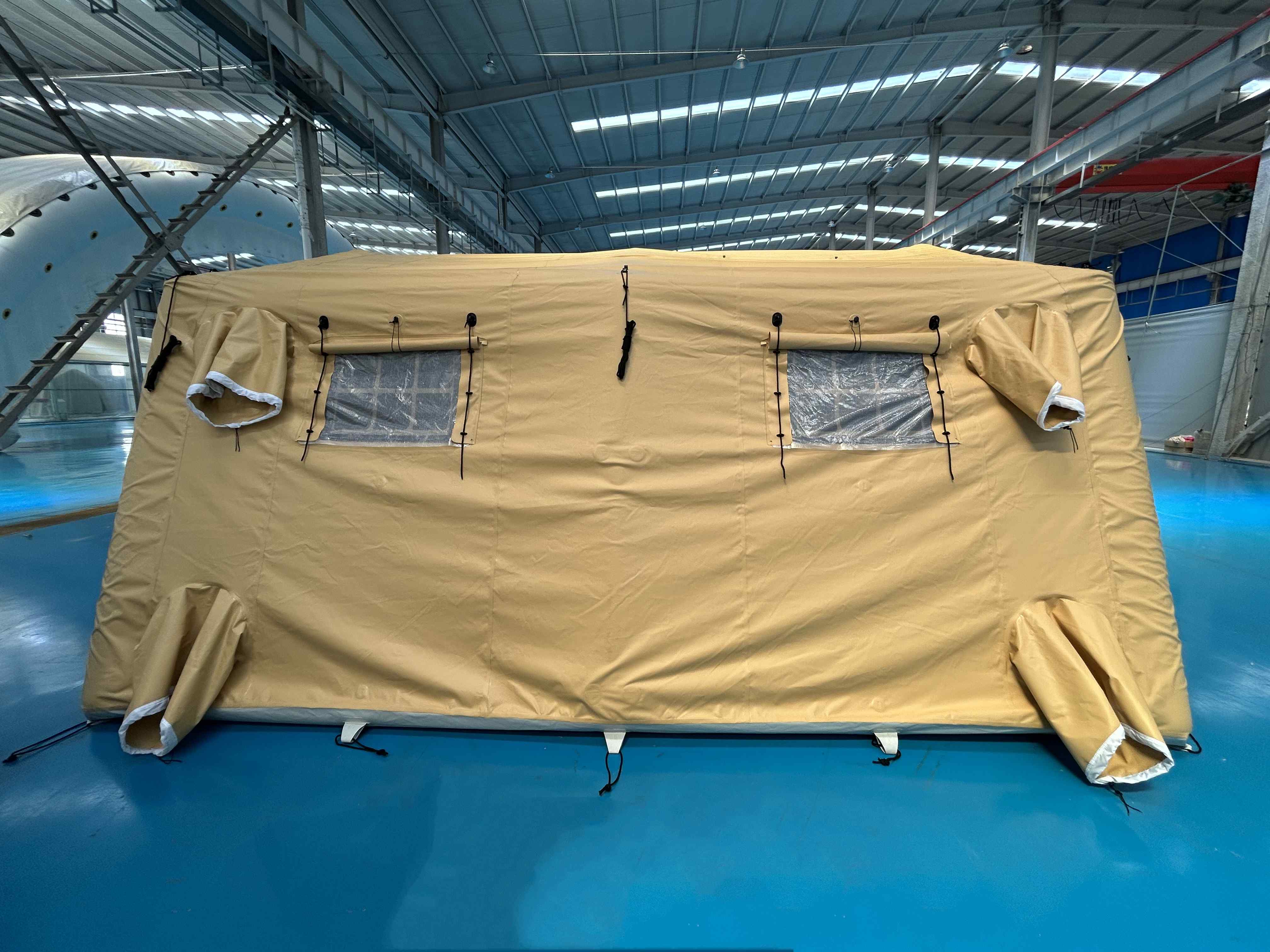 Inflatable tent window