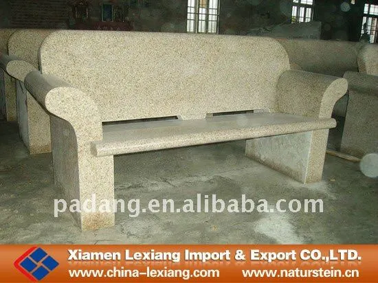 Yellow stone bench with back