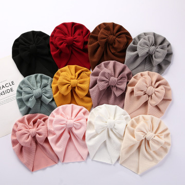 Newborn Baby Solid Color Hooded Hat with Bow and Snake Pattern - Perfect Spring and Autumn Accessory