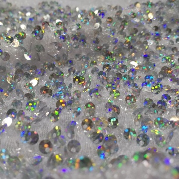Tissu de robe pailleté métallisé irisé holographique