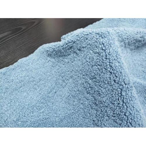 100% polyester Sherpa-liknande fleece varp-stickat tyg
