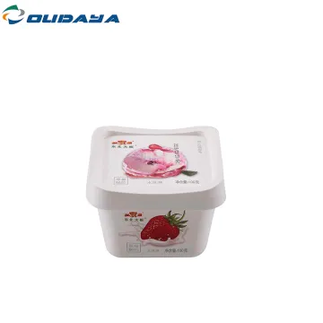 square yogurt cup with lid and spoon