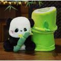 Giant pandas eat bamboo stuffed animals