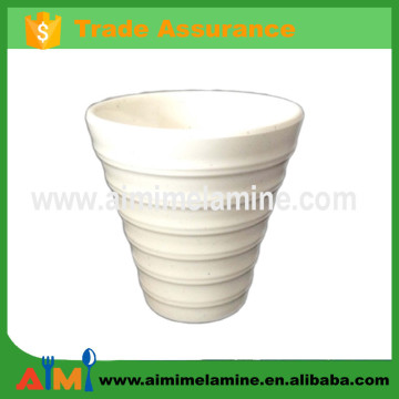 White 100% melamine cup with wavy shape