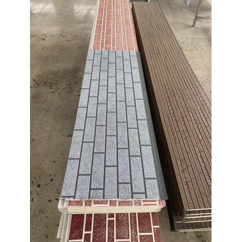 Metal Carved Panels With Water Patterns Covering Brick Patterns