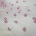 Tessuto in tulle velato in nylon con fiori di prugna con stampa in schiuma