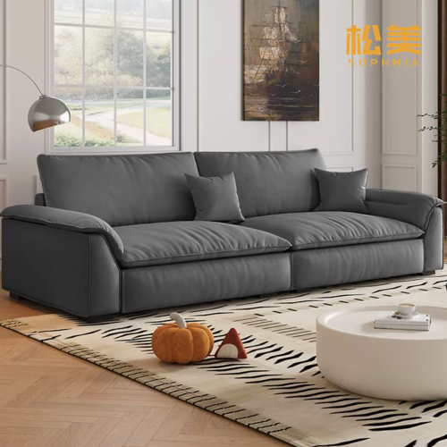 Большой диван из мягкой ткани бежевого цвета