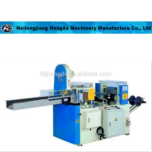 Paper napkin making machine with embossing