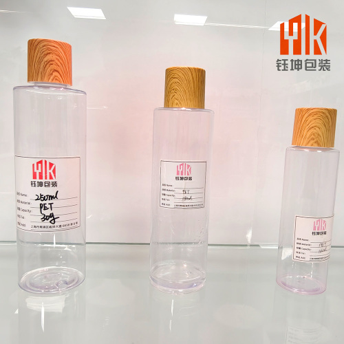 Frasco com tampa de madeira PET transparente para líquidos cosméticos