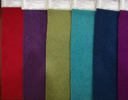 Knitted wool viscose polyester blend boucle fabric