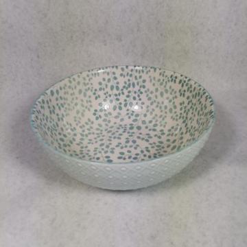 Embossed stoneware bowls and mugs
