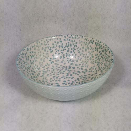 Embossed stoneware bowls and mugs