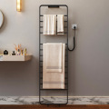 Household floor-mounted electric towel rack without punching