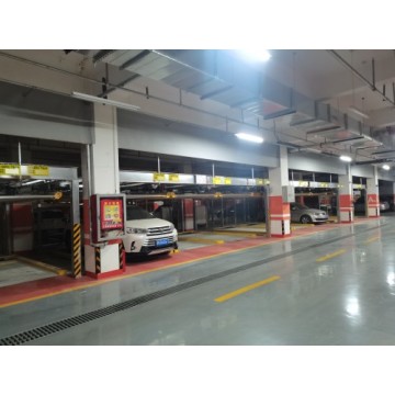 Two layer puzzle parking system of pit type