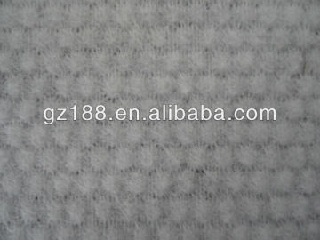 embossed spunlace nonwoven