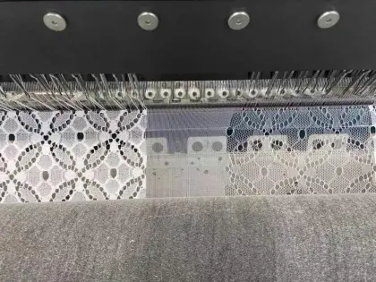 Jacquard lace warp knitting machine