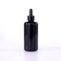 Black round shoulder glass bottle for essential oil