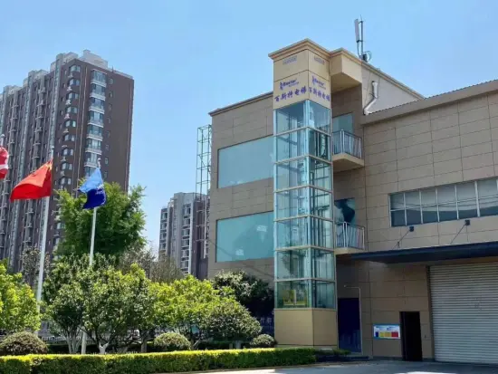 Glass Elevator Installed Outside of Bester Woskshop