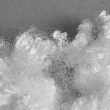 Regenerated HCS polyester staple fiber for clothing