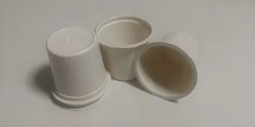 Fully degradable white disposable coffee cup