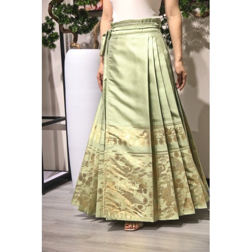 falda plisada de color verde claro