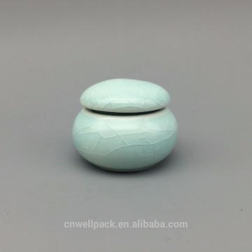 Different sizes colorful ceramic jars for cosmetic products