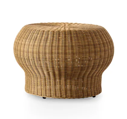 A set of rattan woven cushions and coffee tables
