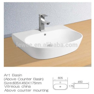 Populart parryware above counter bathroom using Art basin