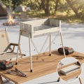 Parrilla de barbacoa de carbón plegable portátil minimalista con mango de madera – Parrilla liviana para acampar al aire libre