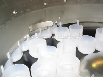 Automatic 5 gallon Gasket into the capping machine