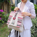 Mochila multifuncional de lino y algodón con estampado de triángulos
