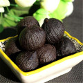 peeled single bulb black garlic