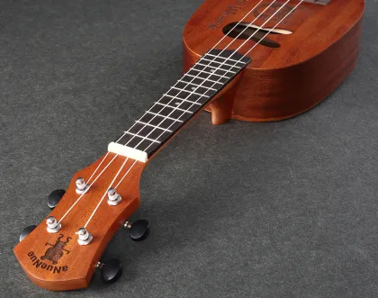 Mahogany lettering carved ukulele