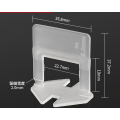 Solid white base of tile leveler