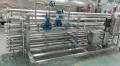 Industriell automatisk UHT -mjölksaftsterilisator