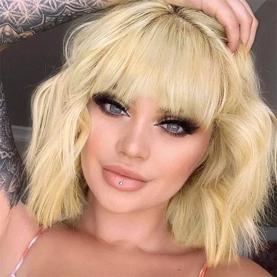 Short Blonde Wavy Bob Wig with Bangs for Women Girls Natural Looking Pastel Blonde Wigs Curly for Daily Cosplay Halloween