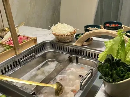 Lifting smokeless hot pot table