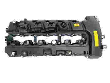 Integrated PCV valve cover with pressure regulation