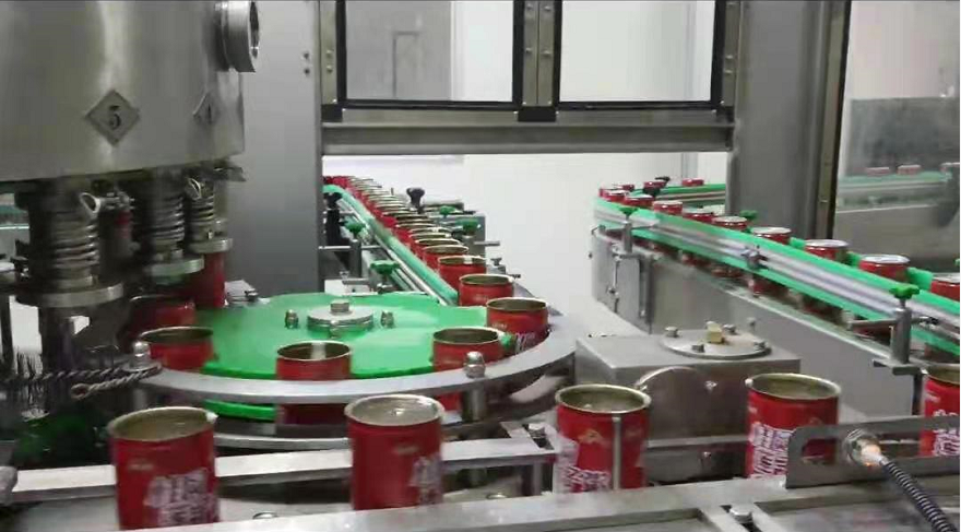 Filling and seaming machine for Aluminum cans