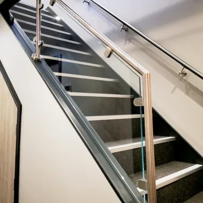 Simple glass railing for modern European stairs