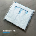 Babero dental desechable con corbata