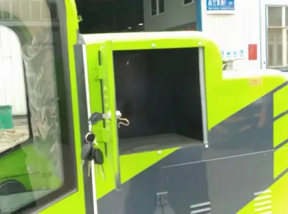 fully enclosed road sweeper