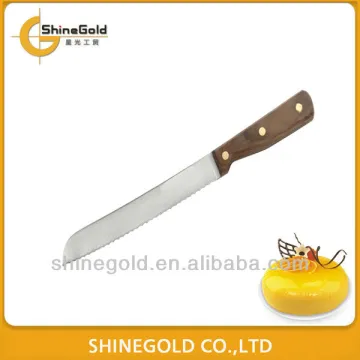 Stainless steel bread knife in wooden handle