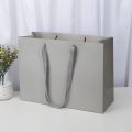 Großhandel recycelbare Geschenkbeutel mit Bandgriffen