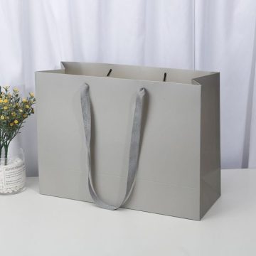 Großhandel recycelbare Geschenkbeutel mit Bandgriffen