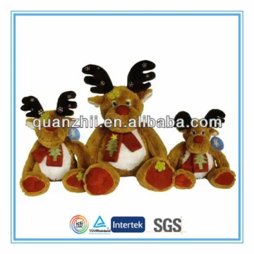 plush toy reindeers with red scarf